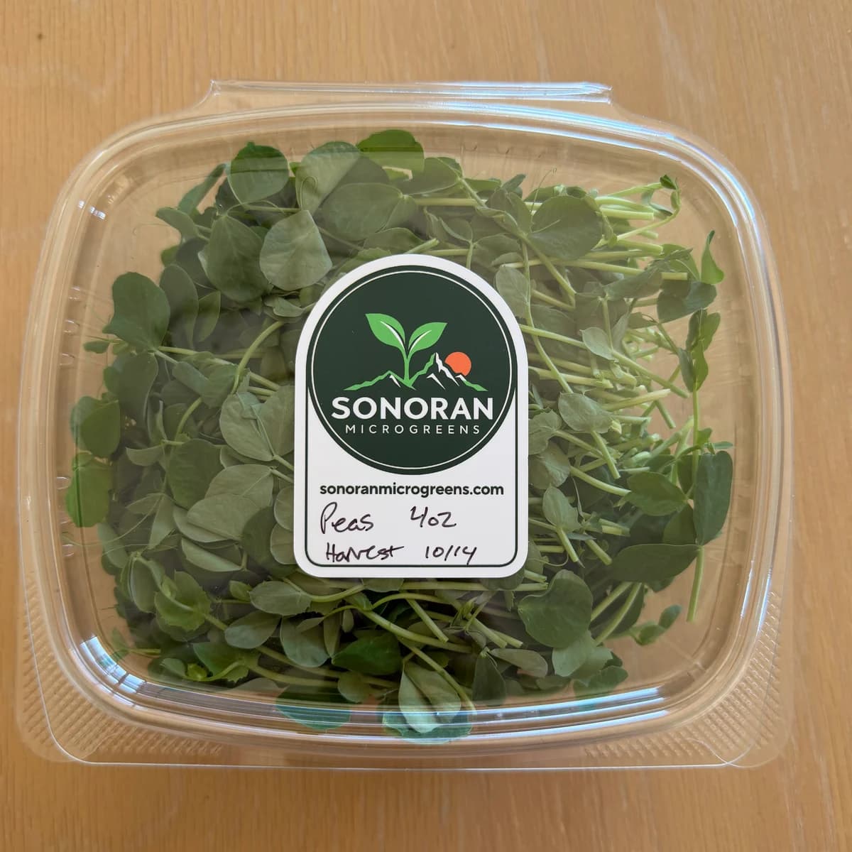 Peas in a labeled four-ounce package